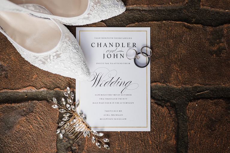 Wedding invitations, shoes and rings